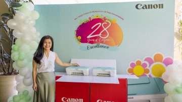 Sandy-Lee-Head-of-Personal-System-Devices-Division-at-Canon-Marketing-Malaysia-reveals-the-new-green-white-PIXMA-E-Series-printers.jpeg